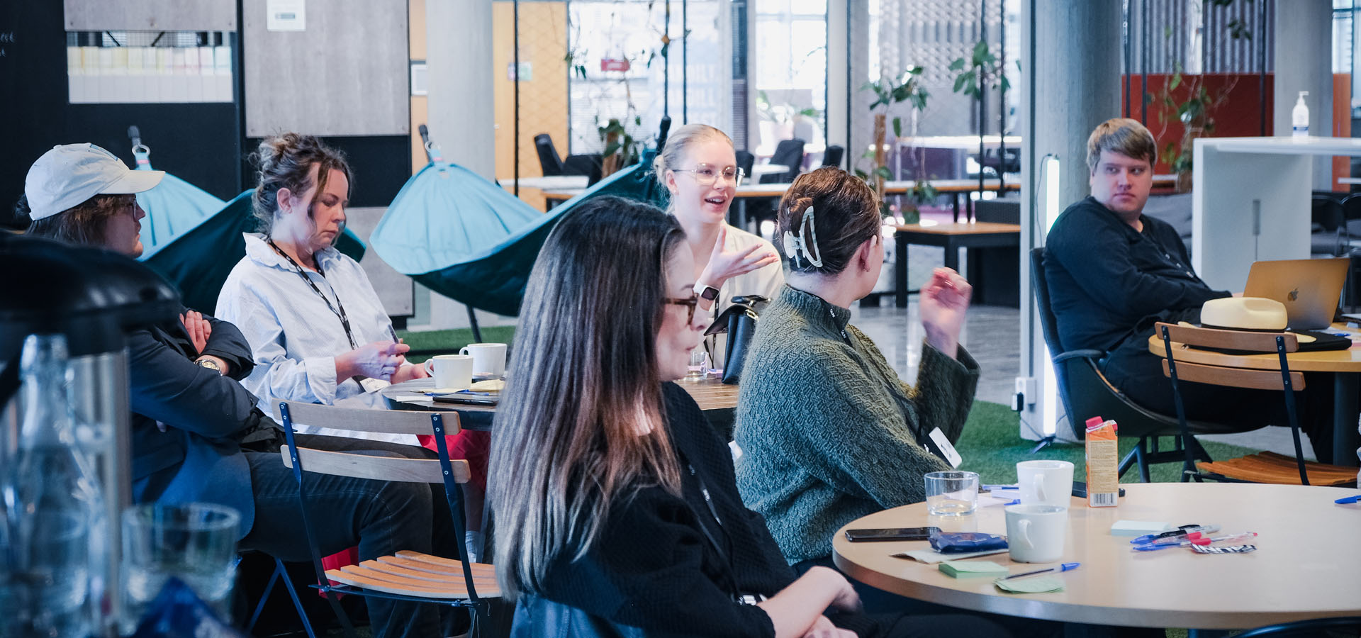 Event photography at 4UNI 2023, capturing teams, speakers, and workshops focused on economic equality and future finance challenges.